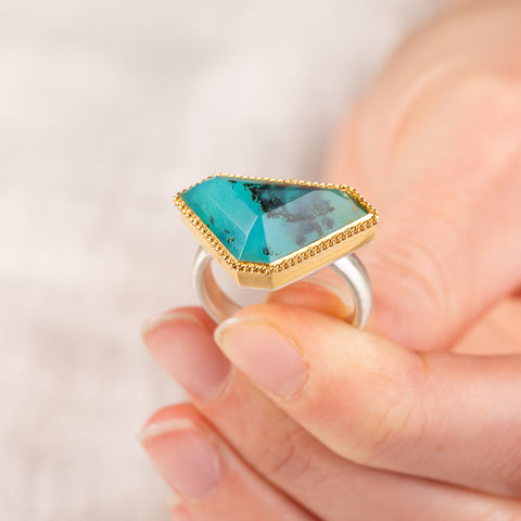 Peruvian opal ring with gold bezel and sterling silver band