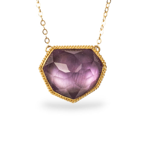 Amethyst necklace on white background