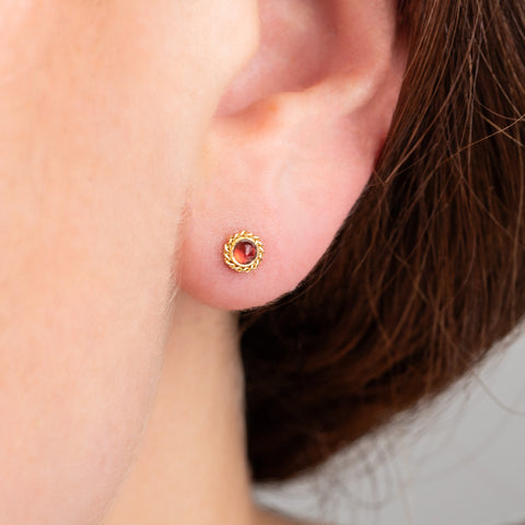 Apatite stud earrings on model