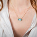 Aquamarine necklace on model side view