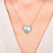 Aquamarine heart necklace on a model
