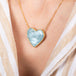 Heart shaped Aquamarine necklace on model side view