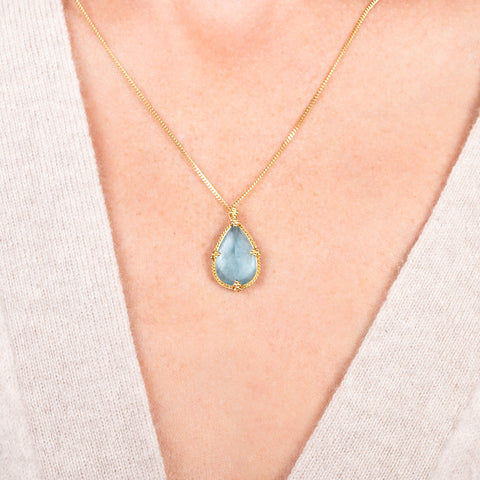 Misty blue aquamarine necklace on a mode