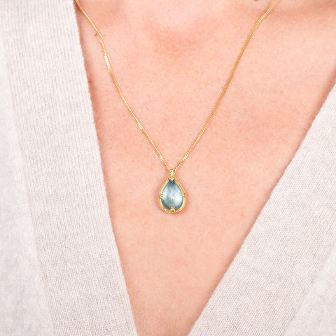 Aquamarine teardrop necklace on a model