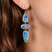 australian opal earrings on model