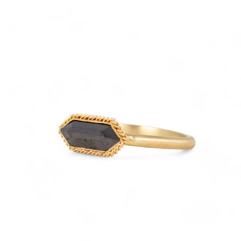 Black diamond and gold ring side view