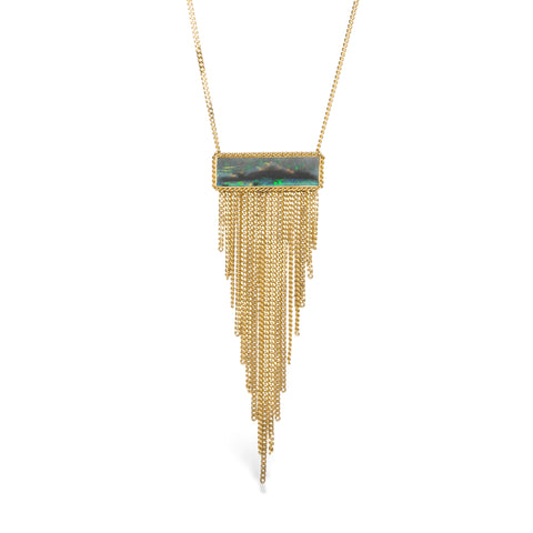 Handcrafted fine jewelry necklace featuring a black opal gemstone and 18k gold tassel adornment