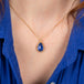 Tanzanite teardrop necklace on model