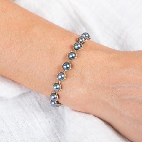 Blue akoya pearl bracelet on model