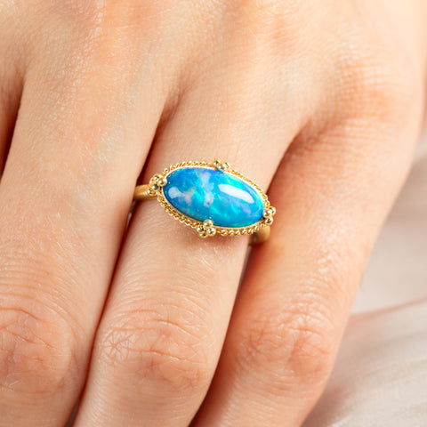 Blue ethiopian opal ring close up