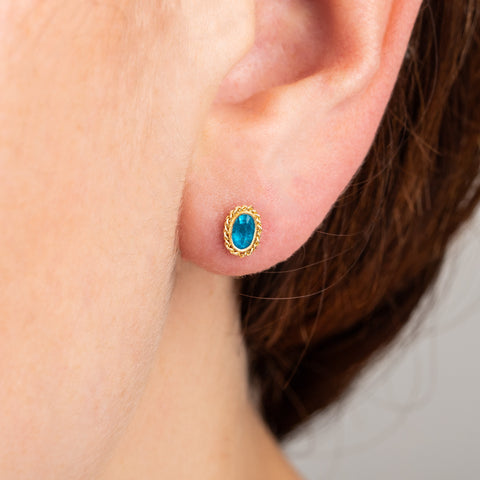 Blue tourmaline stud earrings on model