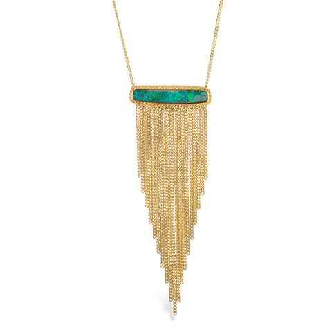 A handcrafted necklace featuring a boulder opal gemstone and 18k gold tassel adornment