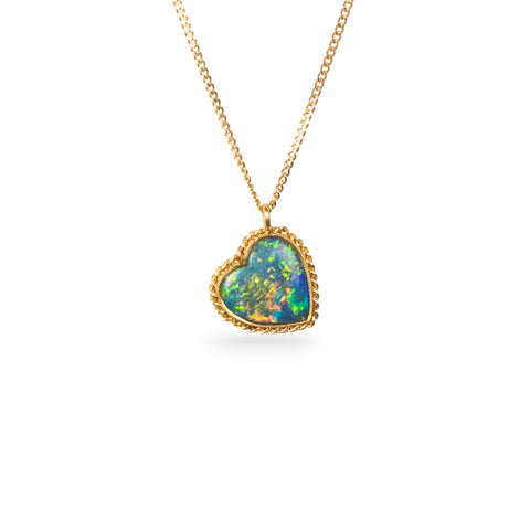 Boulder opal heart necklace on white background