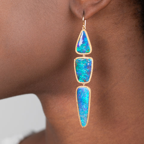 Boudler Opal earrings on model