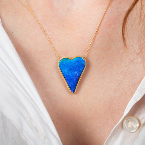 Boulder opal heart necklace on model