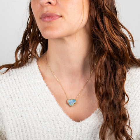 Boulder opal heart necklace on model