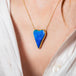 boulder opal heart necklace on model side view