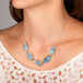 Boulder opal pebble necklace on model