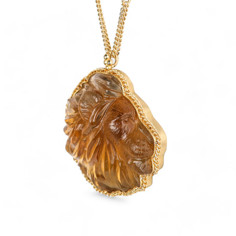 Carved citrine lion necklace side view