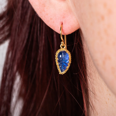 Carved leaf moonstone earrings on model