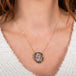 Amali carved tourmaline flower necklace on model