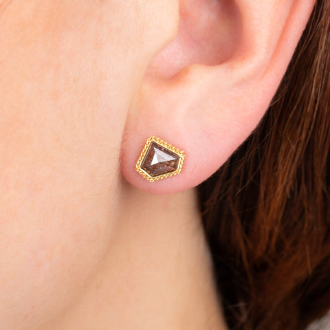 Diamond stud earring on model