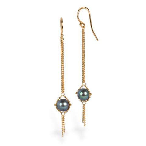 Blue akoya pearl earrings on white