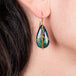 Draped Azurite Malachite earrings on a model