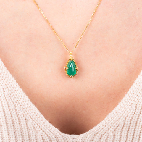 Emerald necklace on model
