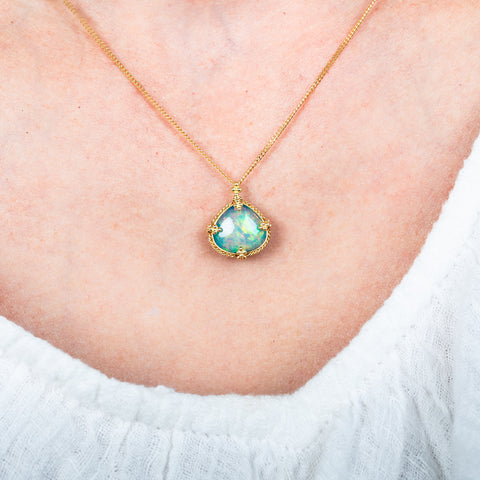 Ethiopian opal necklace on model