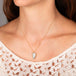 Ethiopian opal necklace on model 