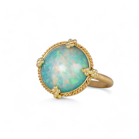Round ethiopian opal ring on white
