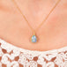 Ethiopian opal necklace on model close up