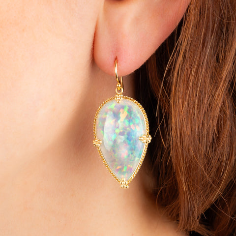 Ethiopian Opal earring on model