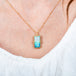 Ethiopian opal necklace on model