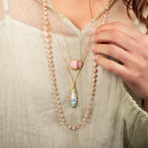 Pink opal necklace paired with pink opal elephant and ethiopian opal