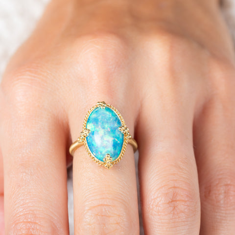 Ethiopian Opal and Gold Ring on model