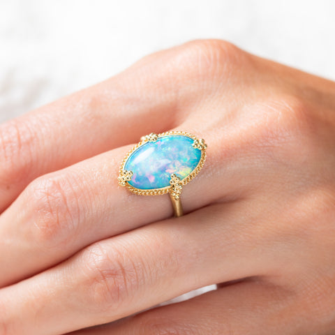 Ethiopian Opal and Gold Ring on model