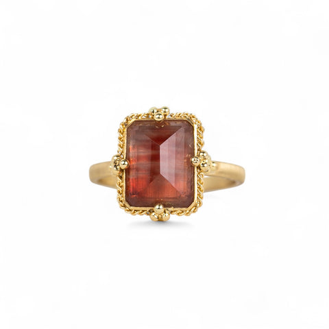 Spessartite and gold ring