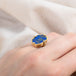 Lapis ring on a model side view