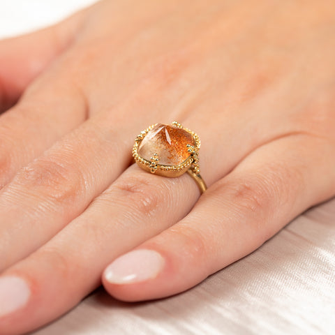 Spessartite and 18k gold ring
