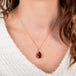 Amali gold tourmaline necklace on model