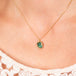 Green tourmaline necklace on model