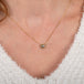 Half moon diamond necklace on model