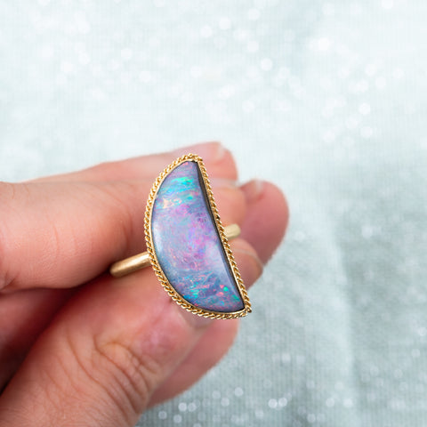Displaying half moon boulder opal ring