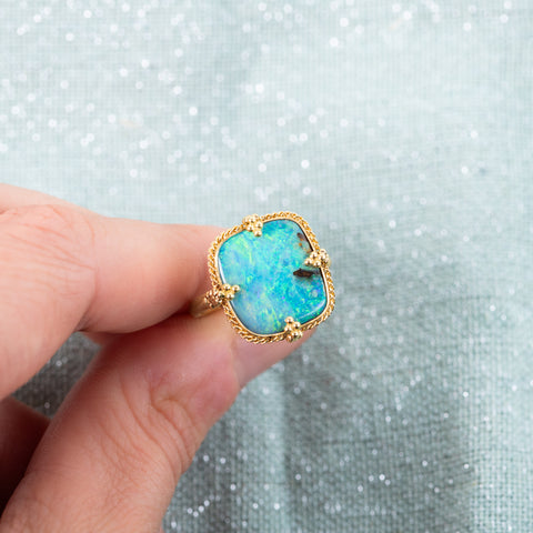 Displaying boulder opal ring