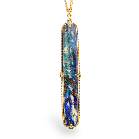 Boulder opal necklace on white background