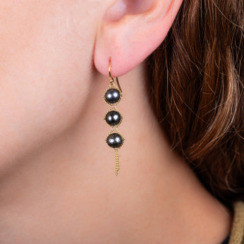 Tahitian Pearl earrings on a model