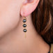 Tahitian Pearl earrings on a model