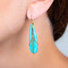 Draped Amazonite earrings on a model